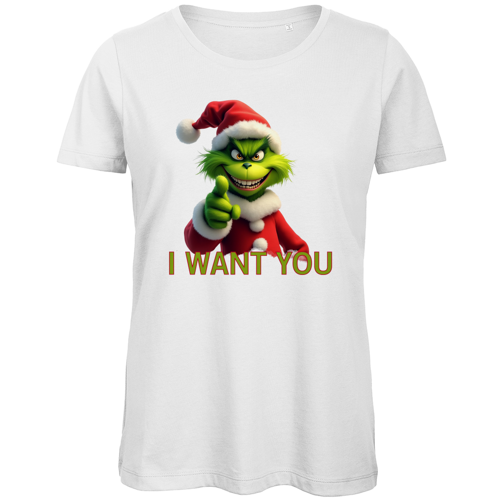 Ein weißes Damen T-Shirt mit einem humorvollen, weihnachtlichen Motiv. Auf der Vorderseite ist eine grüne, grinsende Figur in einem roten Weihnachtsmann-Anzug zu sehen, die direkt in die Kamera zeigt. Darunter steht in gelben Buchstaben mit roter Umrandung der Text "I WANT YOU". Das T-Shirt strahlt eine lustige, festliche Atmosphäre aus und ist perfekt für die Weihnachtszeit geeignet.