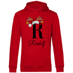 Ein roter Hoodie mit einem festlichen Design, das den Buchstaben „R“ in Schwarz zeigt. Der Buchstabe ist mit einem Weihnachtsmann-Hut und Rentiergeweihen verziert, an denen bunte Kugeln hängen. Unter dem Buchstaben steht der Name „Rudolf“ in eleganter, geschwungener Schrift. Der Hoodie ist perfekt für die Weihnachtszeit und bietet eine persönliche Note, ideal für festliche Anlässe.