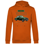 Ein oranger Hoodie mit einem Vintage-Design, das ein klassisches grünes Auto und den Schriftzug "Nostalgia" zeigt. Über dem Auto befindet sich der Text "Old But Gold" in einem dekorativen Rahmen, und darunter steht "Vintage Vehicle" in eleganter Schrift. Ein zusätzlicher Text beschreibt die luxuriösen Details des Fahrzeugs, wie das handpolierte Holzarmaturenbrett und die Ledersitze. Das Design strahlt eine nostalgische und elegante Atmosphäre aus, ideal für Liebhaber klassischer Automobile.