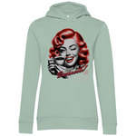 Mintgrüner Damen-Hoodie mit einem Vintage-inspirierten Design. Das Motiv zeigt eine Frau mit roten Locken, die zwinkernd eine Kaffeetasse hält. Der Text auf dem Hoodie lautet „None of my Business!“. Darunter steht: „Your drama is really entertaining to someone else.“. Der Hoodie verbindet Retro-Charme mit einem humorvollen, modernen Statement.