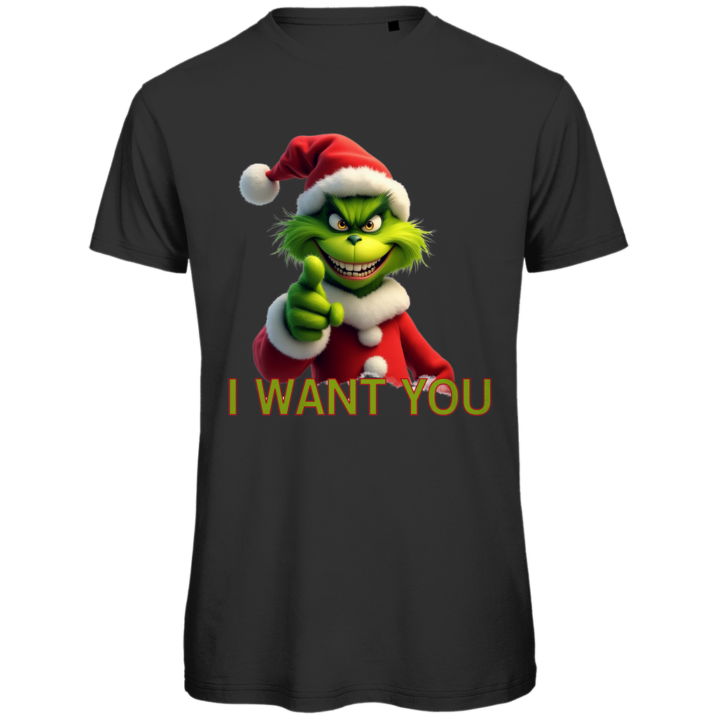 Ein schwarzes T-Shirt mit einem humorvollen, weihnachtlichen Motiv. Auf der Vorderseite ist eine grüne, grinsende Figur in einem roten Weihnachtsmann-Anzug zu sehen, die direkt in die Kamera zeigt. Darunter steht in gelben Buchstaben mit roter Umrandung der Text "I WANT YOU". Das T-Shirt strahlt eine lustige, festliche Atmosphäre aus und ist perfekt für die Weihnachtszeit geeignet.