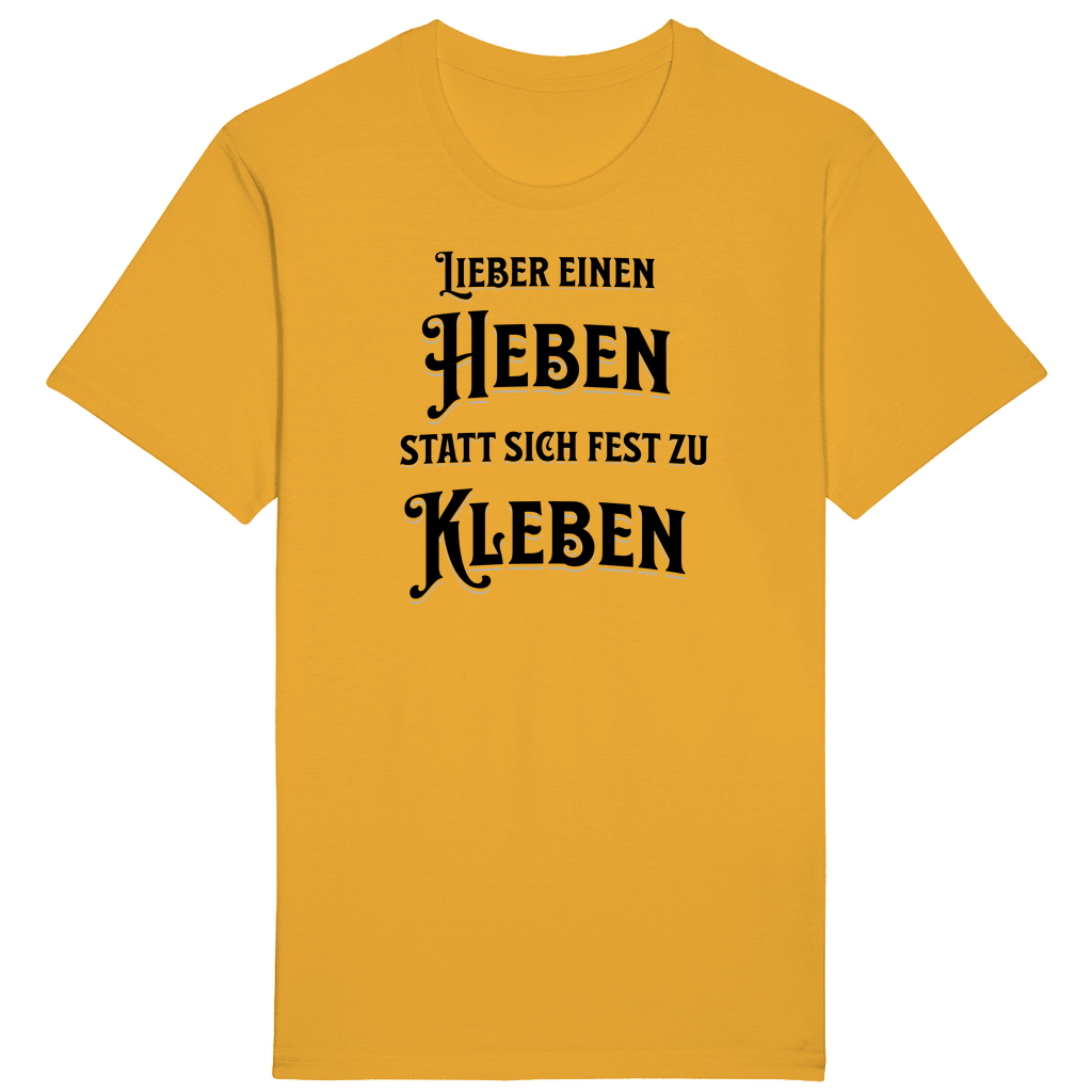 Gelbes T-Shirt mit einem witzigen Spruch: „Lieber einen heben statt sich fest zu kleben.“ Der humorvolle Text ist in einer auffälligen, verspielten Schrift gestaltet und spricht diejenigen an, die das Leben mit einem Augenzwinkern und Gelassenheit genießen. Ein Statement-Shirt für entspannte Lebensfreude!