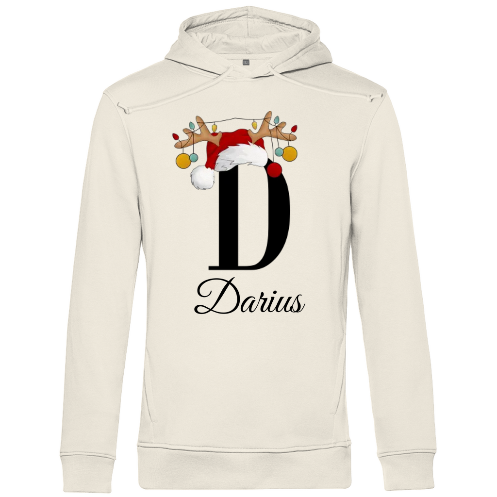 Ein cremefarbener Hoodie mit einem weihnachtlichen Design, das den Buchstaben "D" zeigt. Der Buchstabe ist in Schwarz gehalten und mit einem Weihnachtsmann-Hut sowie Rentiergeweihen verziert, an denen bunte Kugeln hängen. Unter dem Buchstaben ist der personalisierte Name "Darius" in eleganter, geschwungener Schrift zu sehen. Der Hoodie strahlt eine festliche und personalisierte Stimmung aus und eignet sich perfekt für die Winter- und Weihnachtszeit.