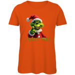 Ein oranges Damen T-Shirt mit einem humorvollen, weihnachtlichen Motiv. Auf der Vorderseite ist eine grüne, grinsende Figur in einem roten Weihnachtsmann-Anzug zu sehen, die direkt in die Kamera zeigt. Darunter steht in gelben Buchstaben mit roter Umrandung der Text "I WANT YOU". Das T-Shirt strahlt eine lustige, festliche Atmosphäre aus und ist perfekt für die Weihnachtszeit geeignet.