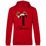 Ein roter Hoodie mit einem weihnachtlichen Design, das den Buchstaben „T“ in Schwarz zeigt. Der Buchstabe ist mit einem Weihnachtsmann-Hut sowie Rentiergeweihen verziert, an denen bunte Kugeln hängen. Unter dem Buchstaben steht der Name „Thorsten“ in eleganter, geschwungener Schrift. Der Hoodie verleiht eine festliche und persönliche Note, perfekt geeignet für die Weihnachtszeit.